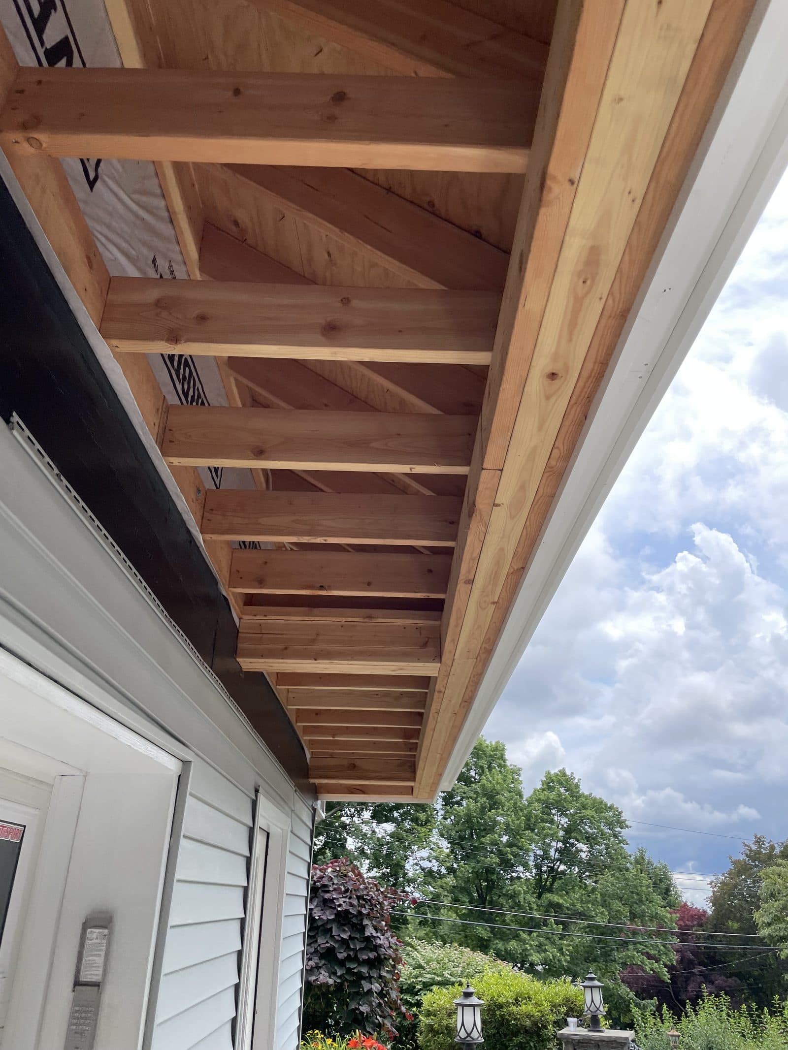 Deck framing joists under construction