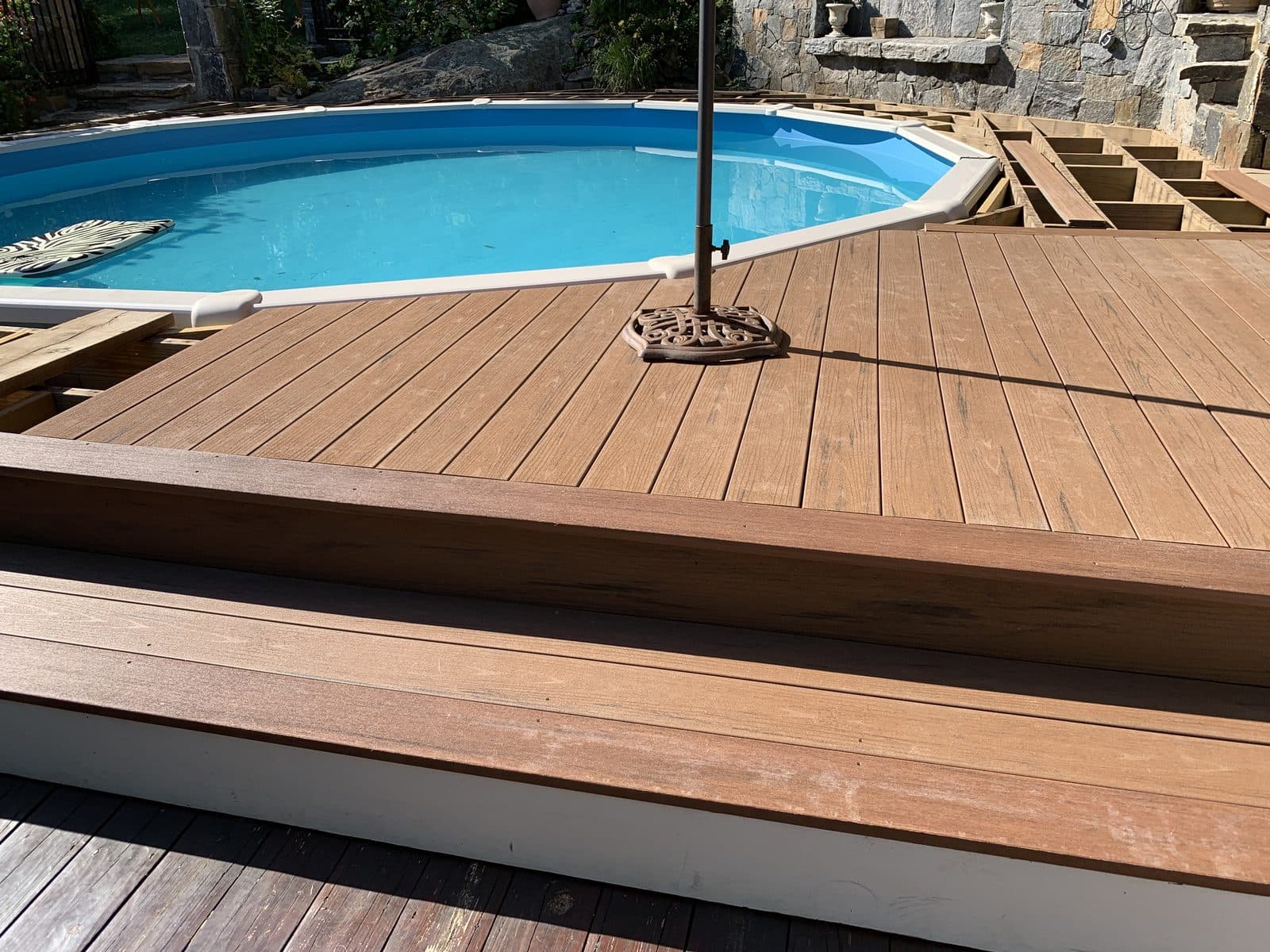 Composite deck with above-ground pool