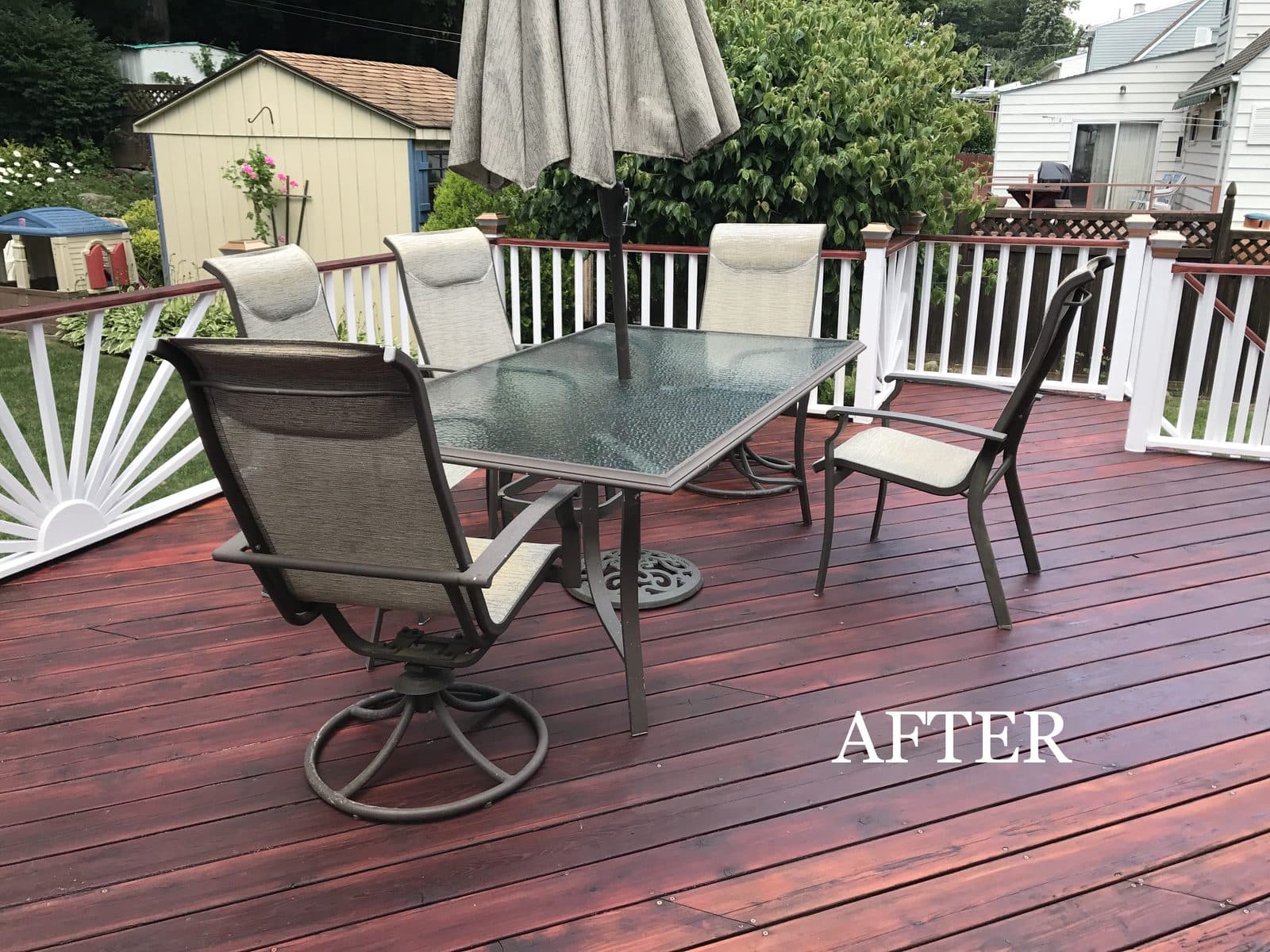 Stained deck with patio furniture