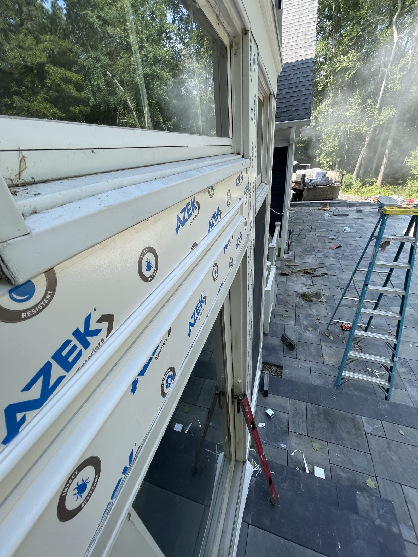 Composite decking boards being installed