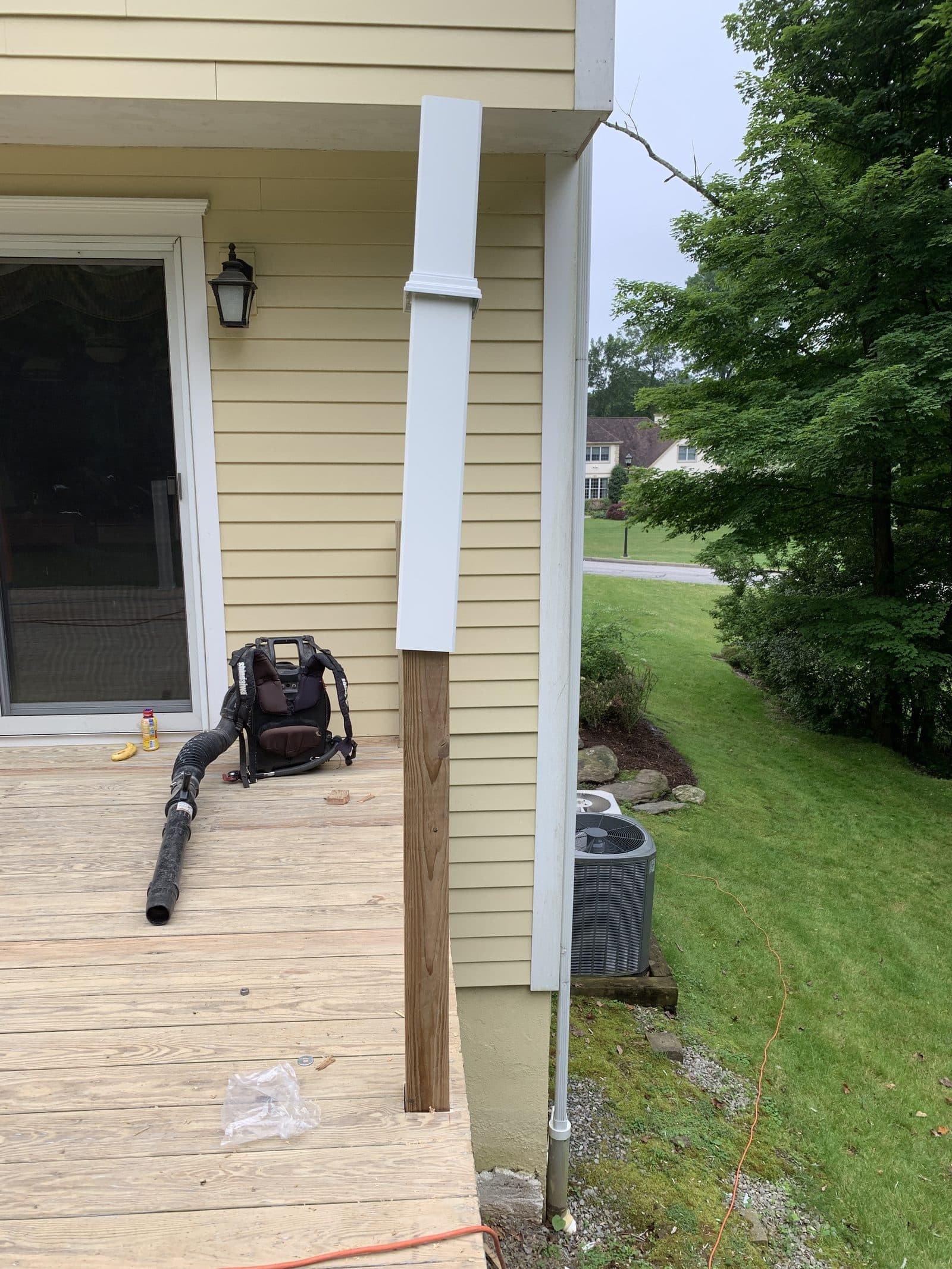 Composite deck with railing and yard