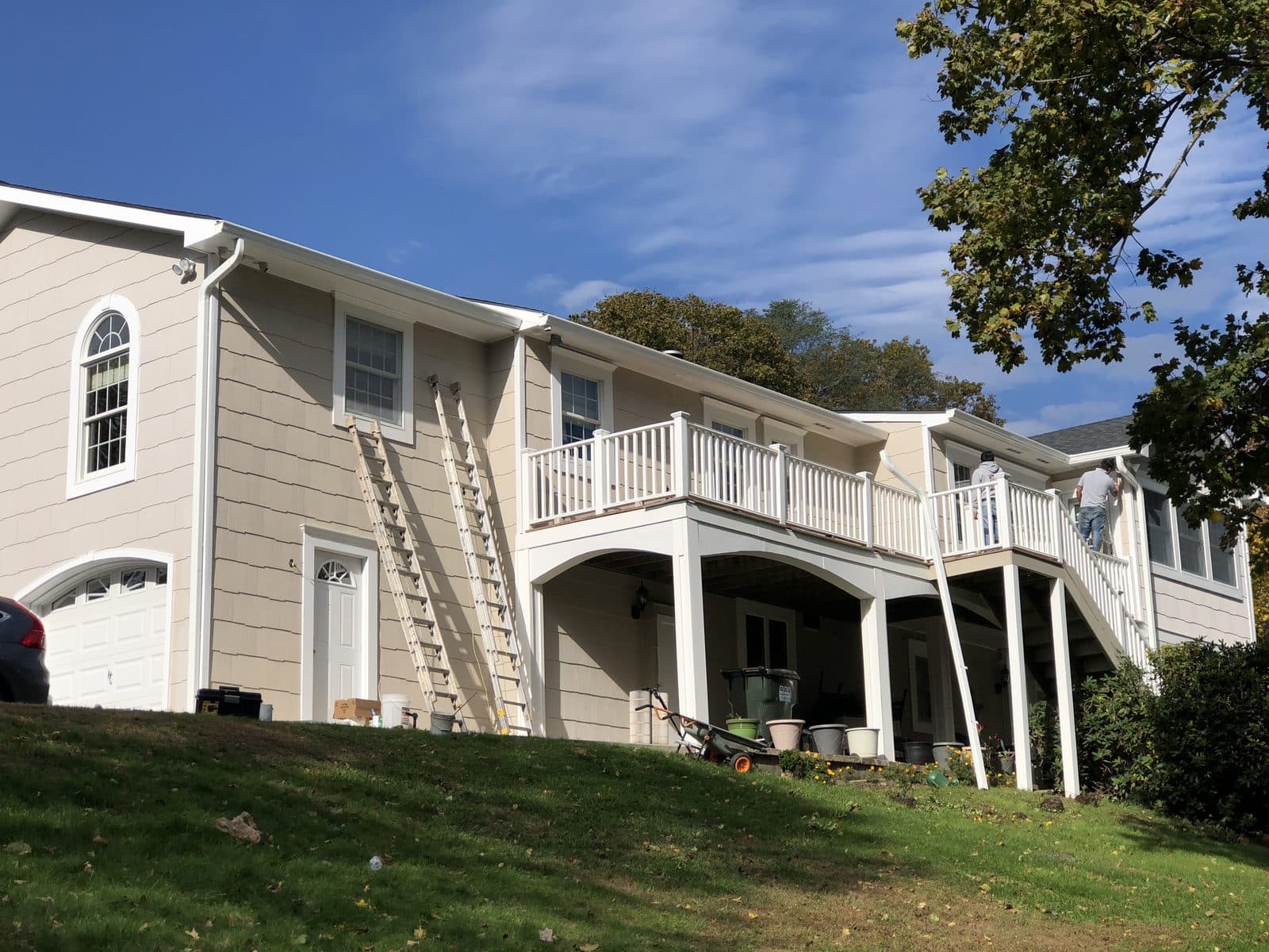 Two-story home exterior with deck