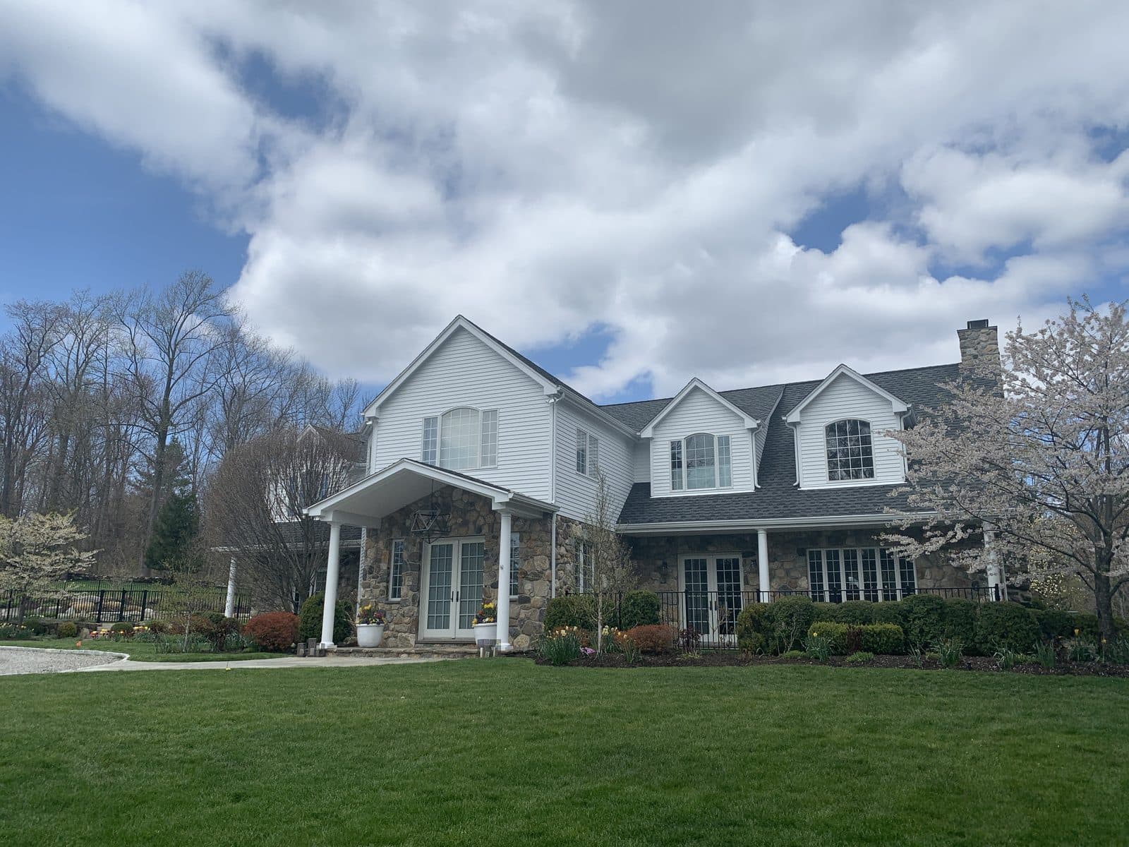 Home exterior with green lawn