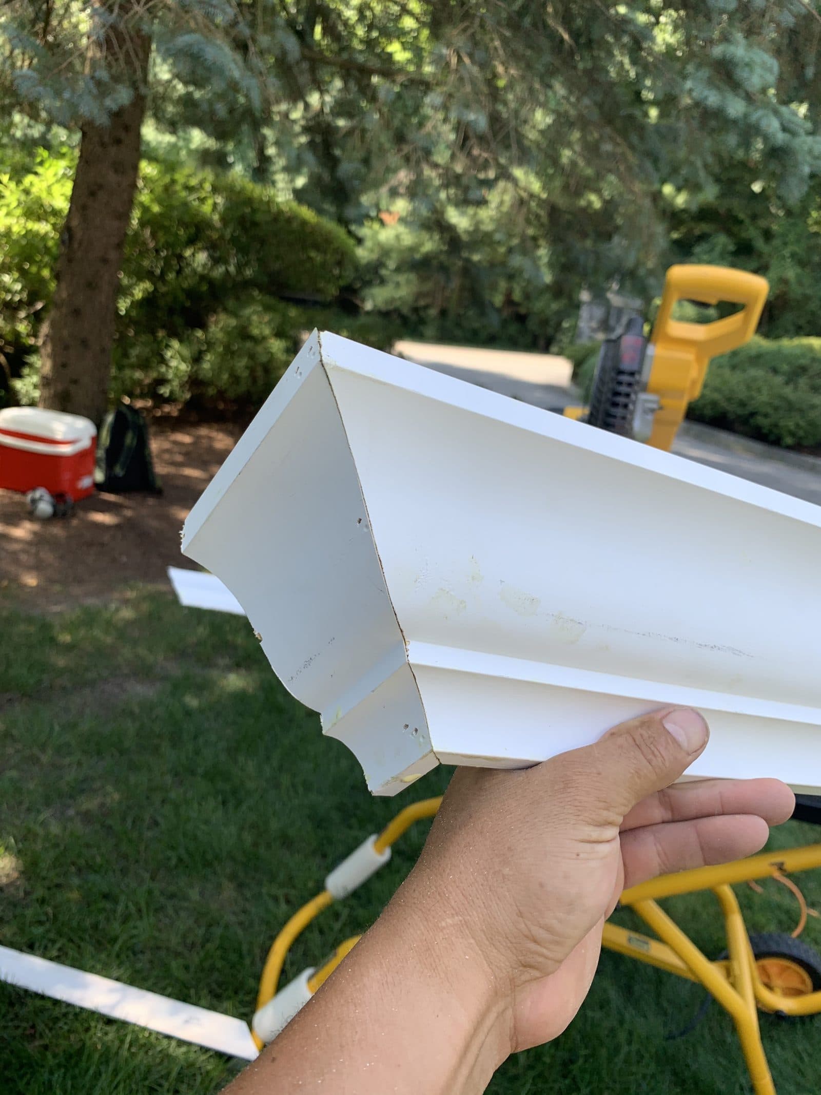 Holding white gutter section