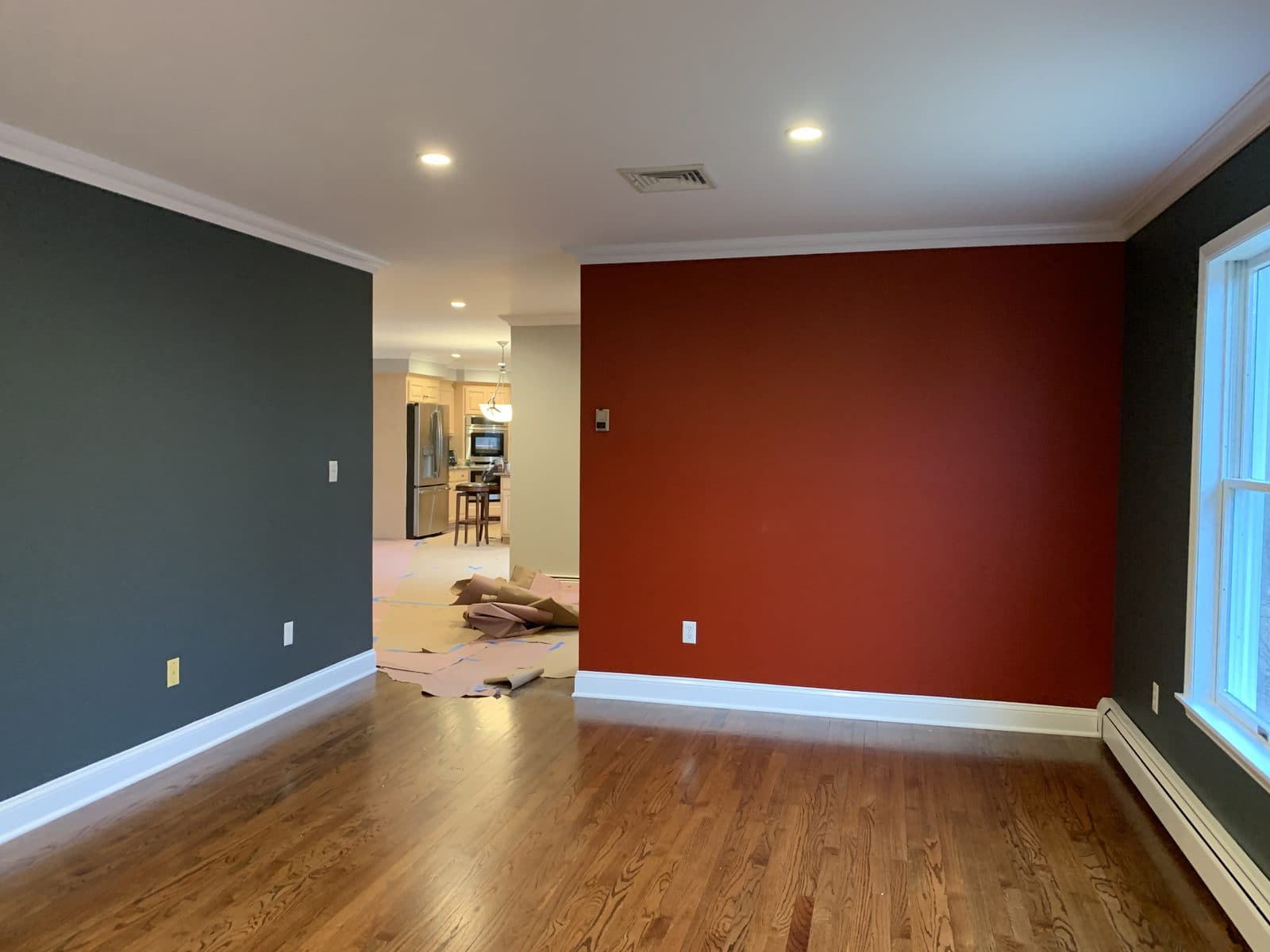 Gray painted room with hardwood floor