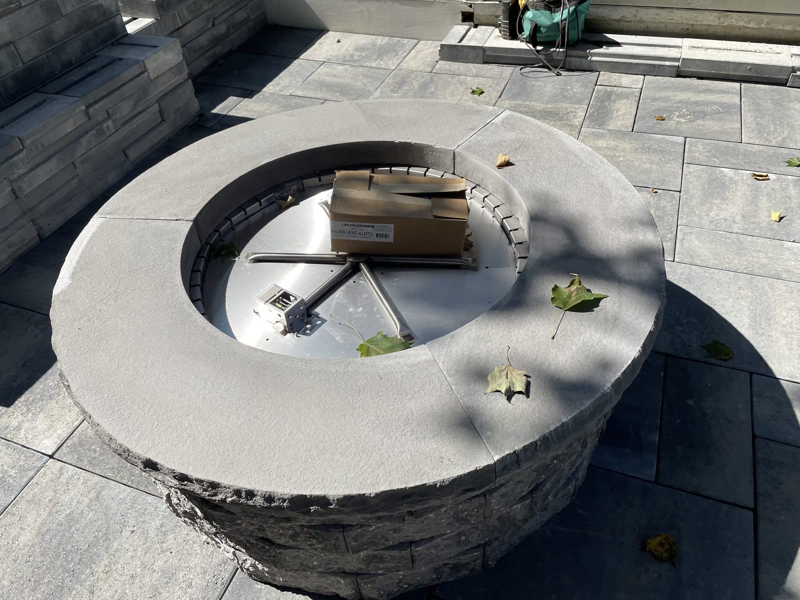 Round stone fire pit construction