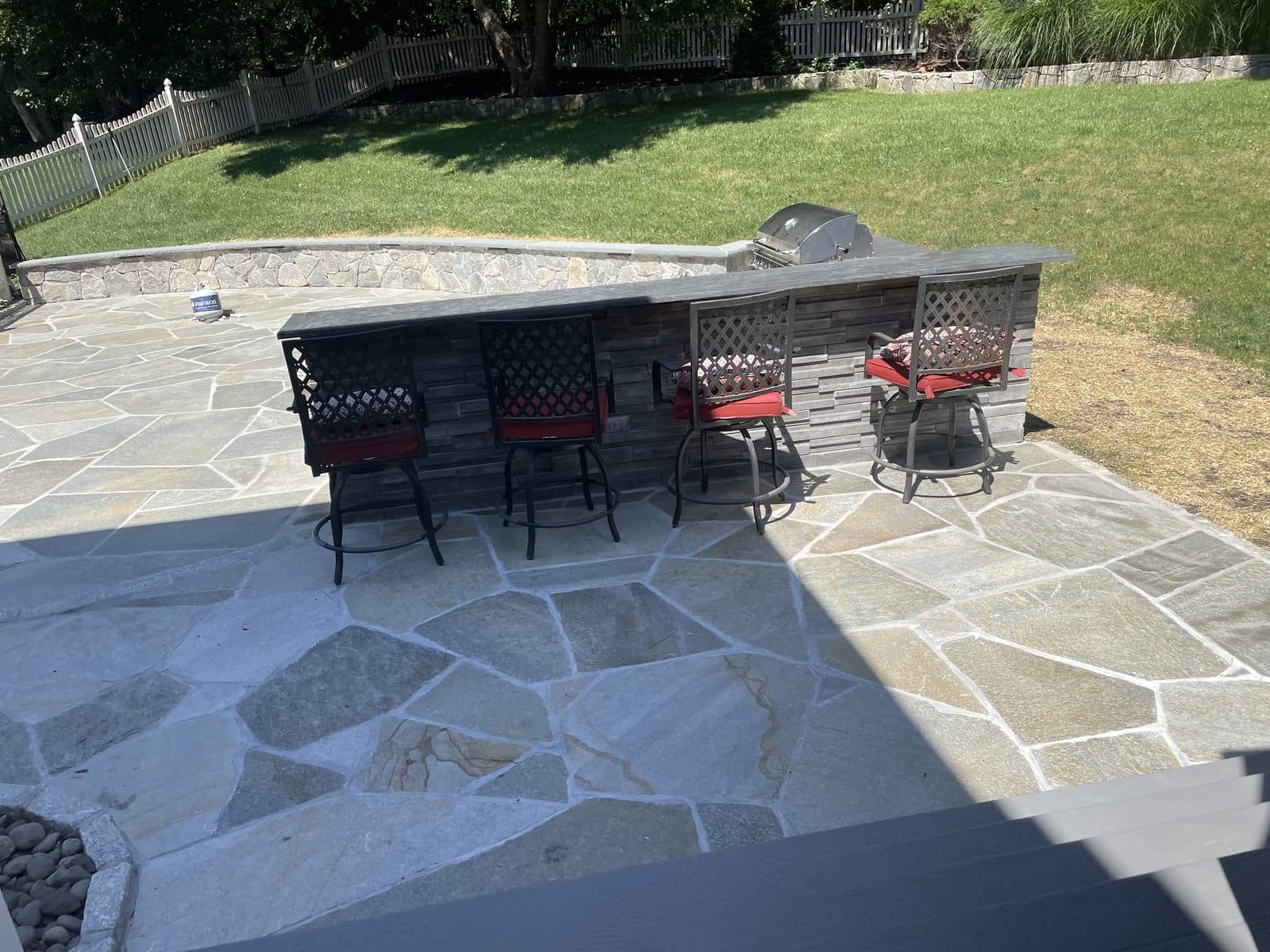 Flagstone patio with bar seating