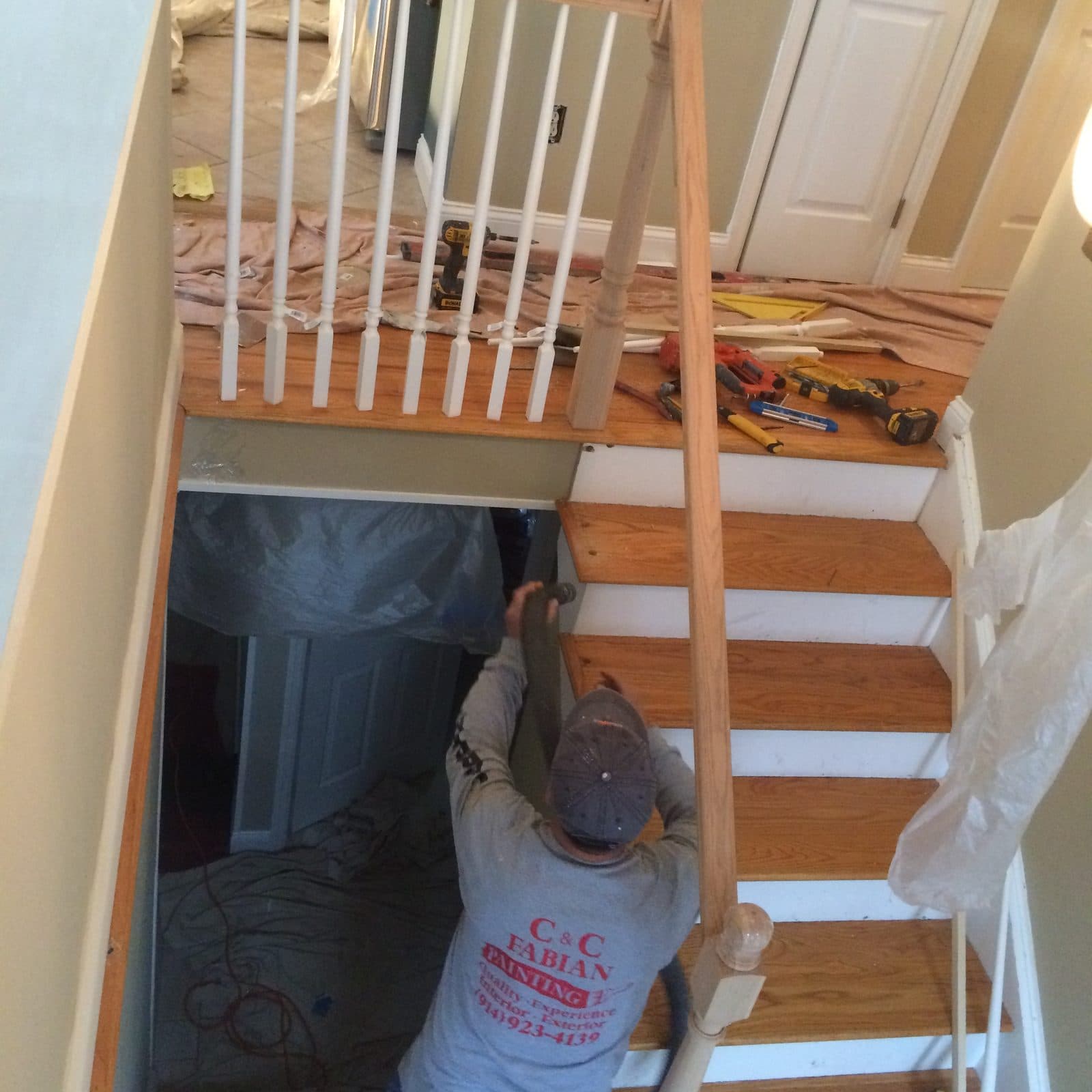 Open staircase being framed during a carpentry remodel