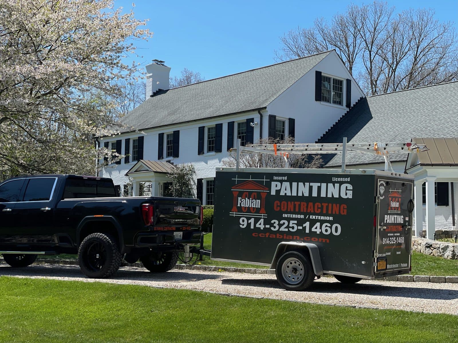 C&C Fabian truck with an enclosed trailer for debris removal
