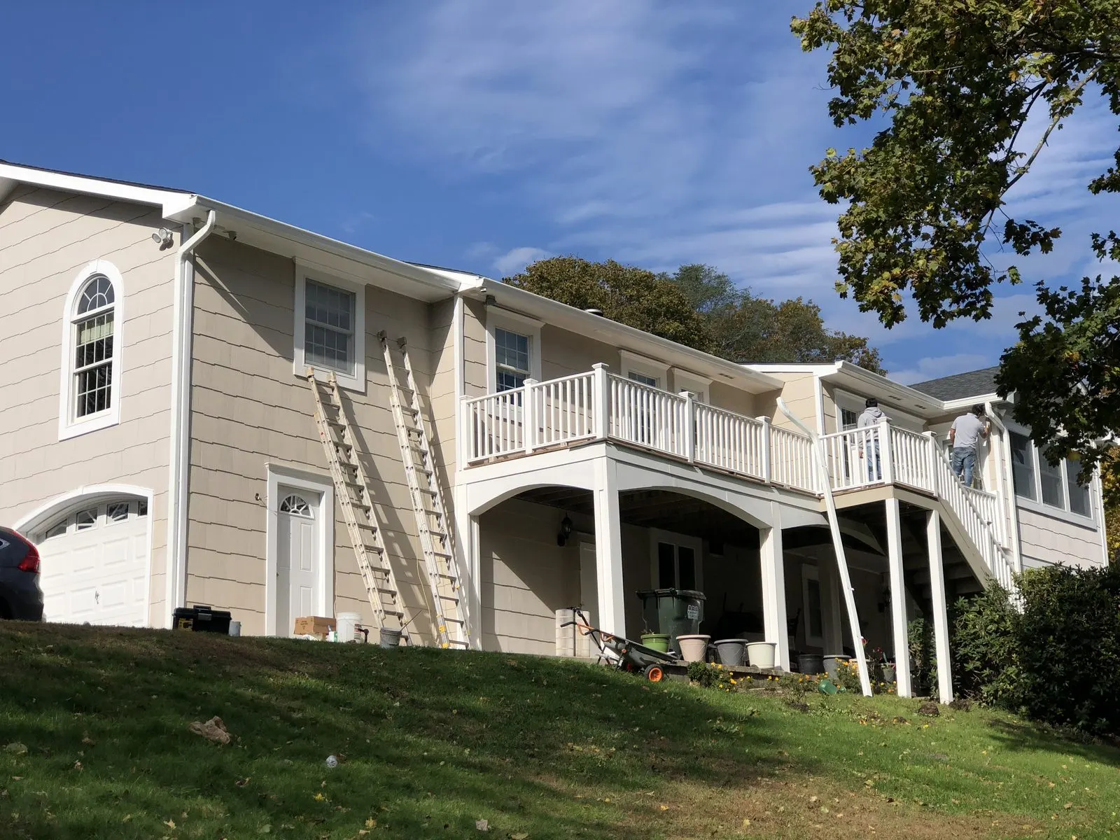 Two-story home exterior with deck