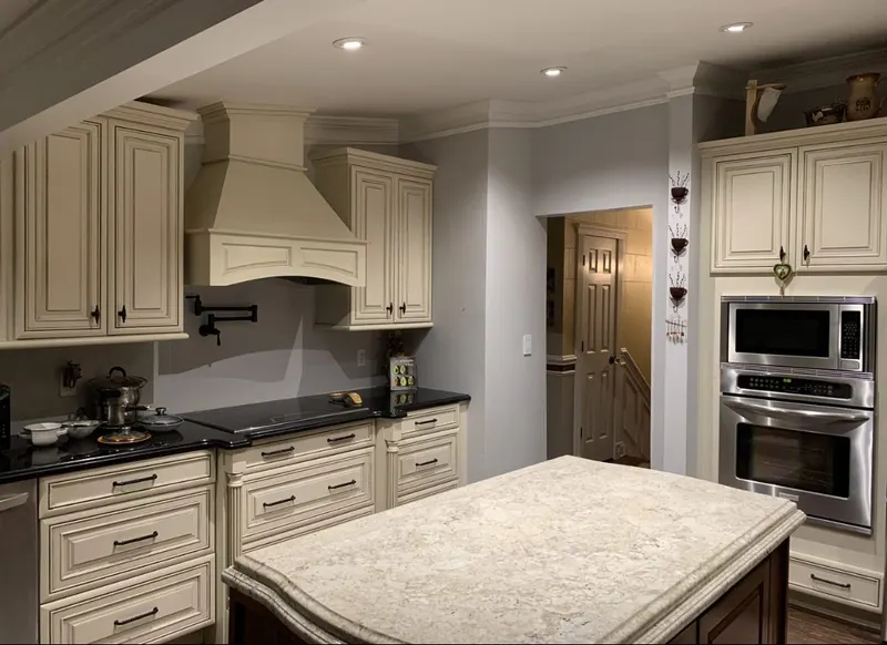 Cream kitchen with island and double oven