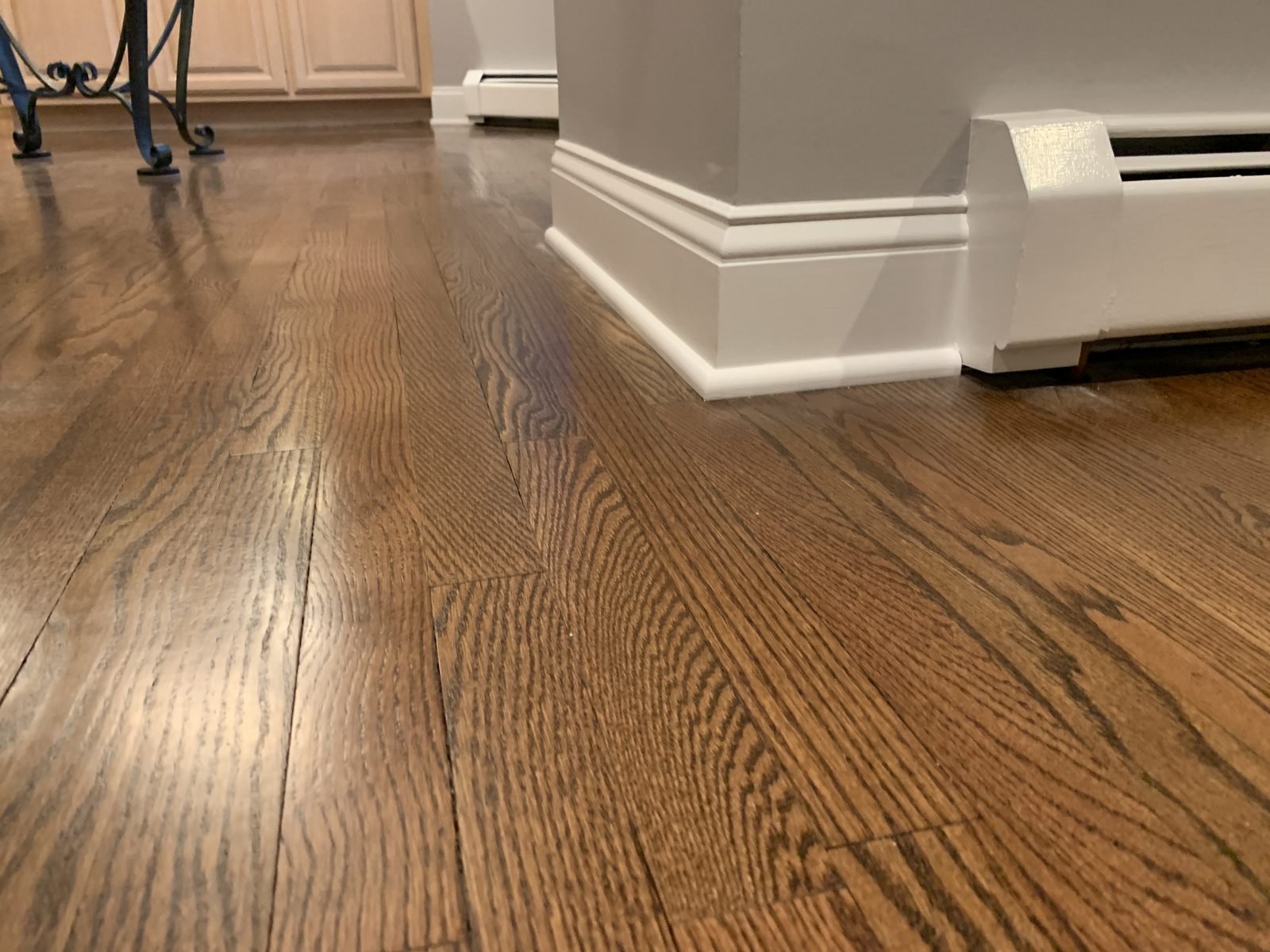 A glossy refinished hardwood floor.